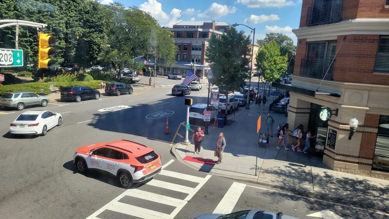 A Life Primary Care car waiting at a crosswalk in a northern New Jersey town centre on the way to a visit